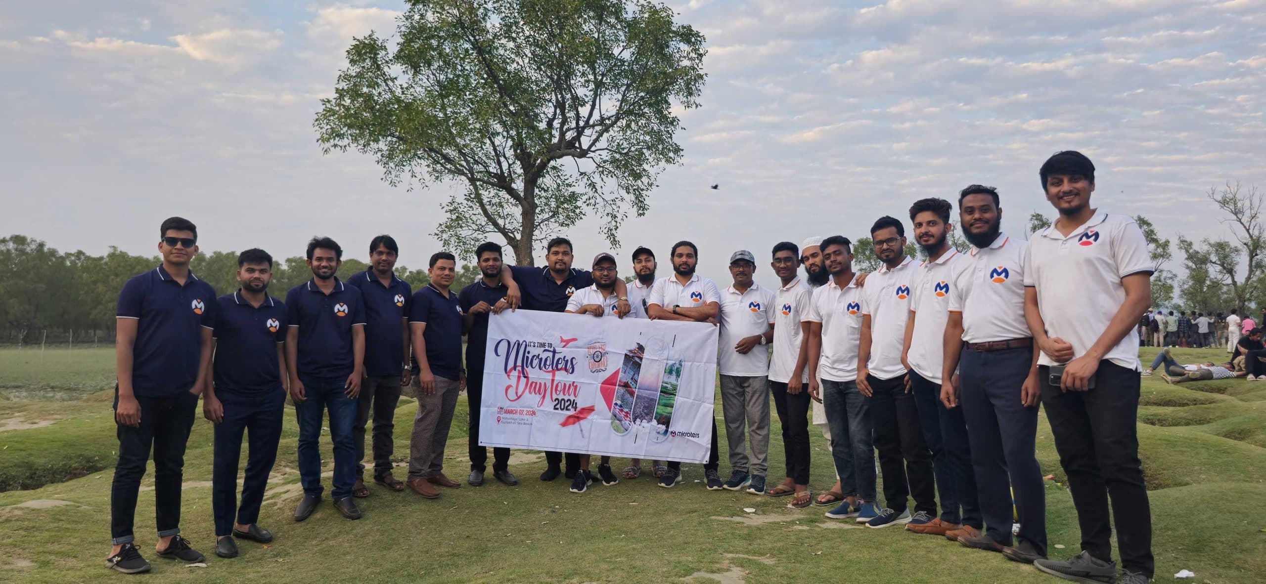 Team members collaborating on a project during an office tour