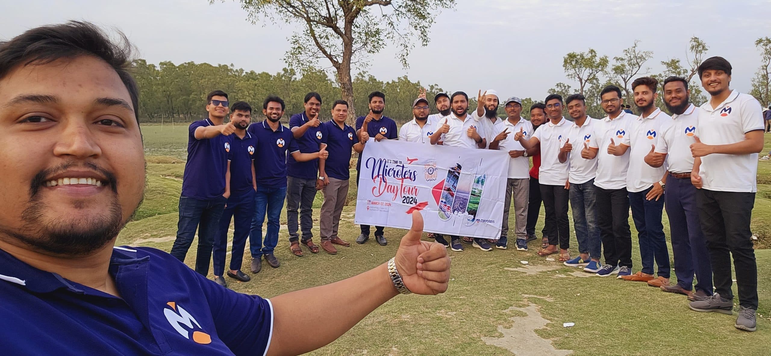 Outdoor team building activity and group photo